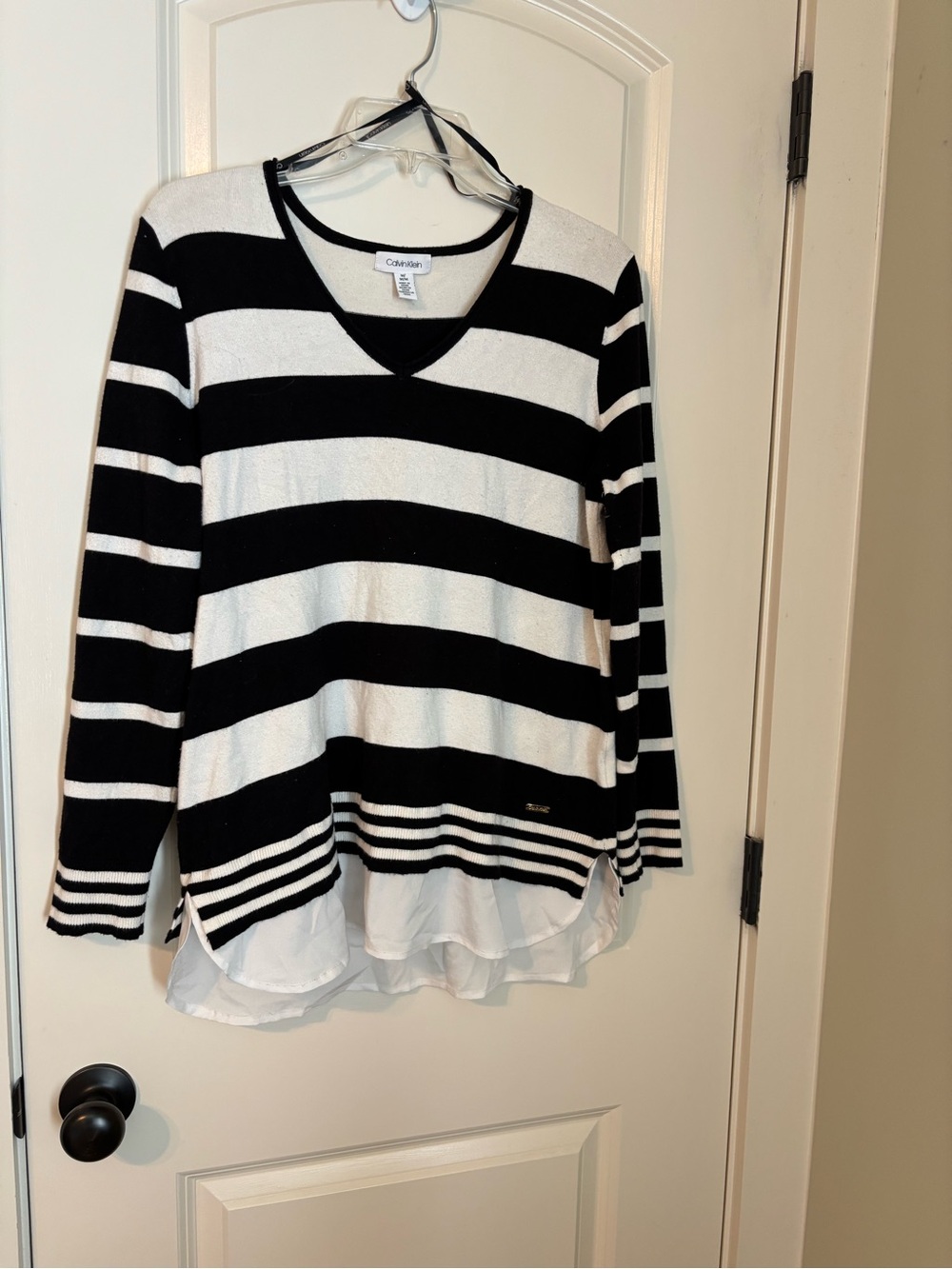 Calvin Klein Black and White Striped V-Neck Sweater with Layered Hem Detail